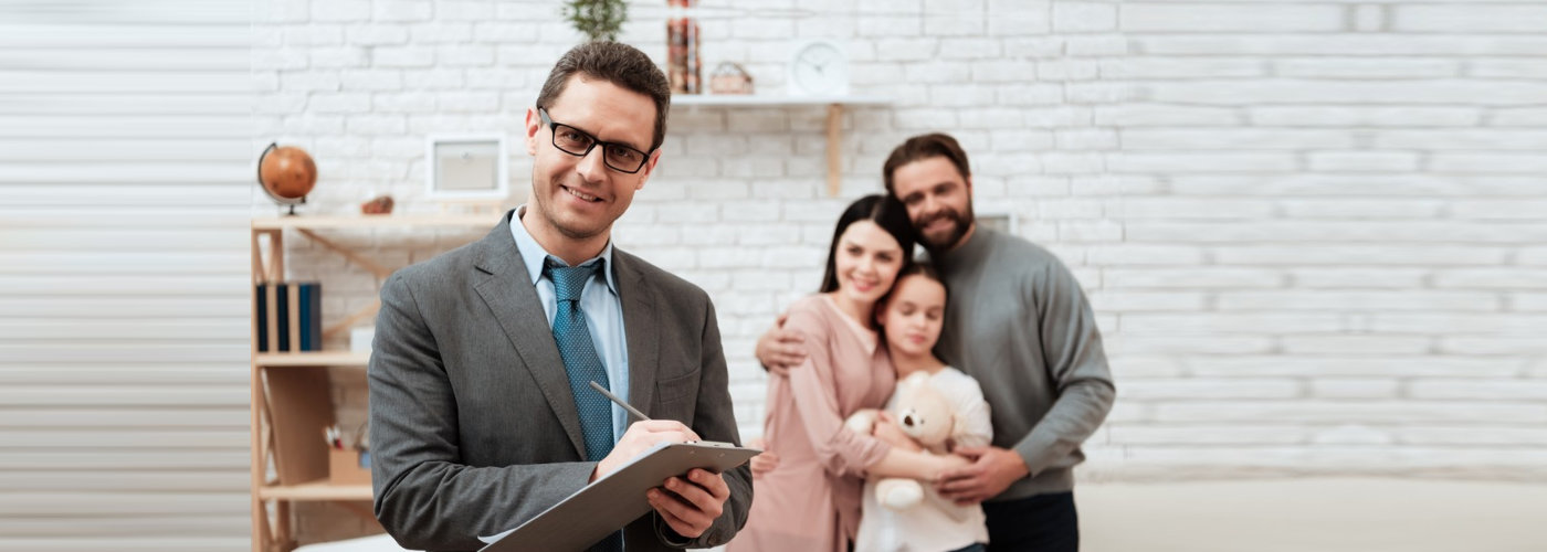 therapist and family smiling