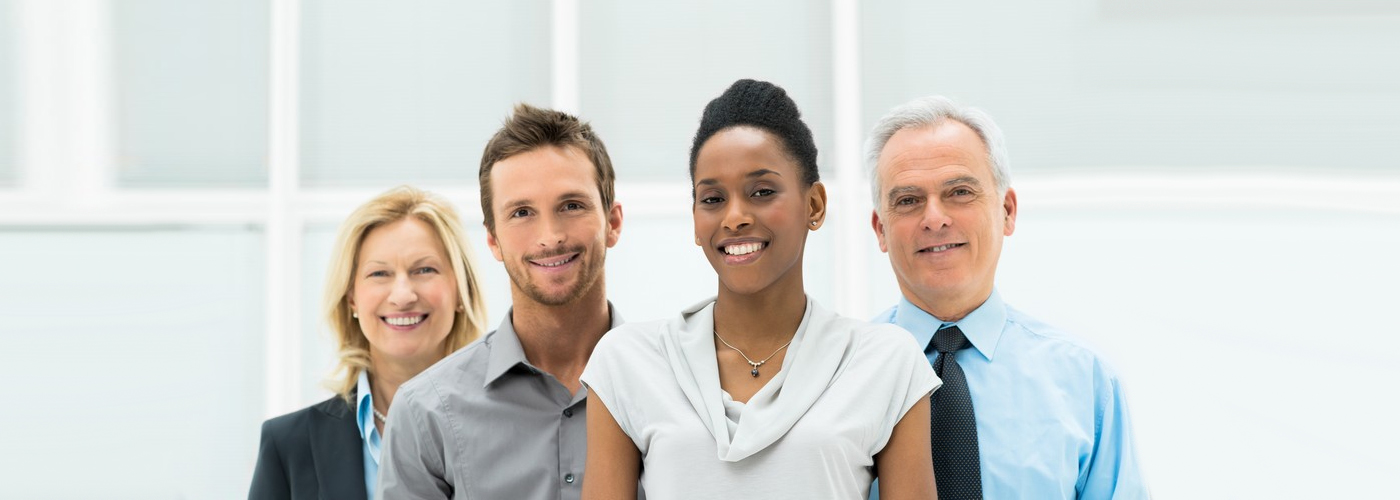 a group of professionals smiling